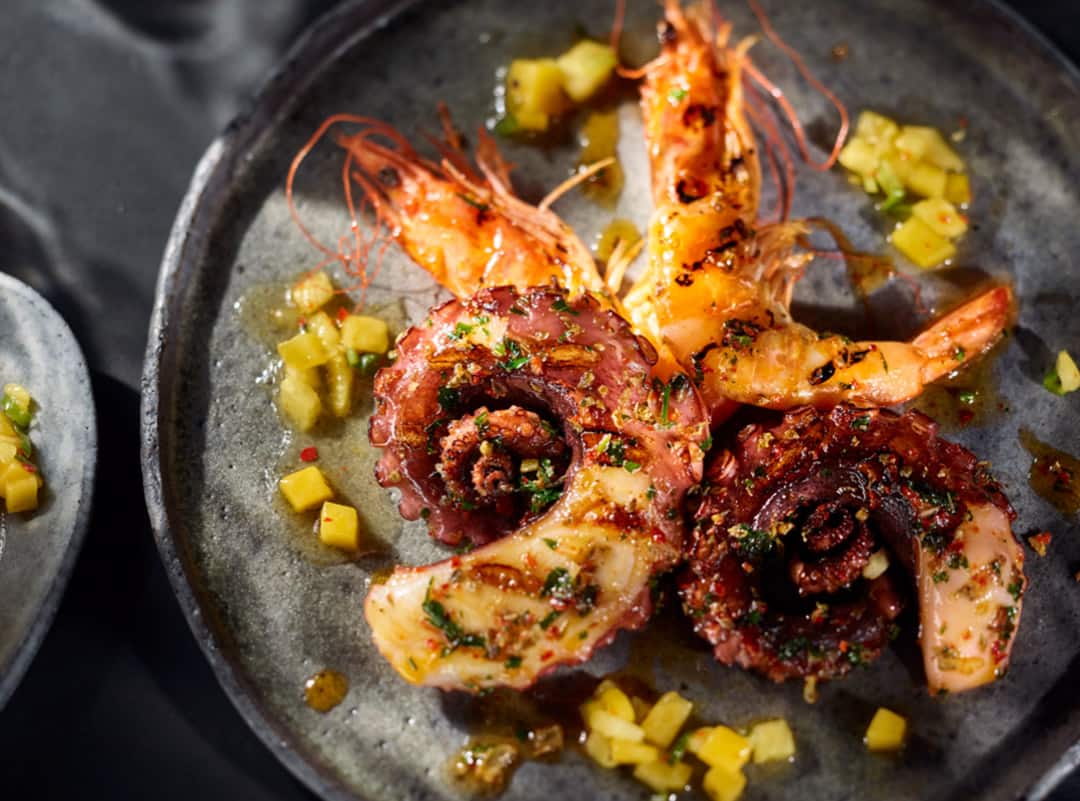 Grilled prawns and pulpo with pineapple salsa